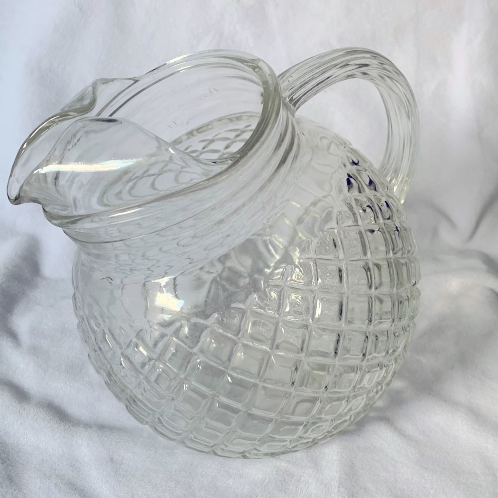 Cut glass pitcher about 7” tall